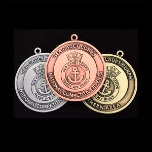 The antique gold silver and bronze Sea Cadet Corp National Competitive Events Awards Medals
