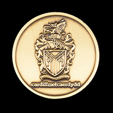 Cardiff Metropolitan University Graduation Medal - 25mm gold antique Graduation Commemorative Lapel Pin - Featured within Rewarding school life Medals UK Blog