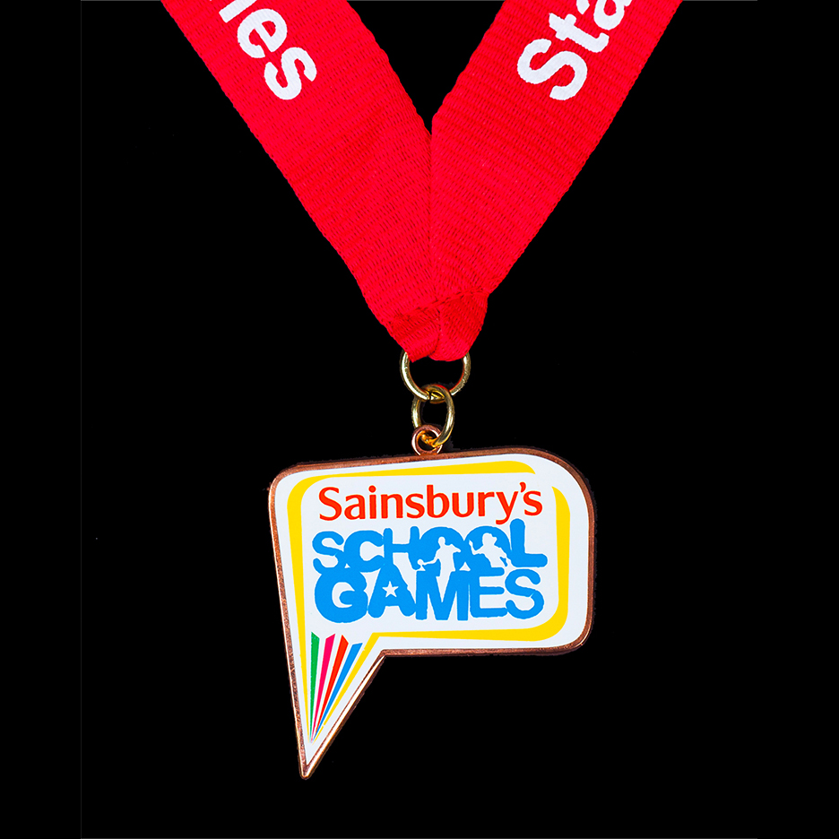 Sainsburys Staffordshire School Games Sports Medal with red ribbon and white print - by Medals UK
