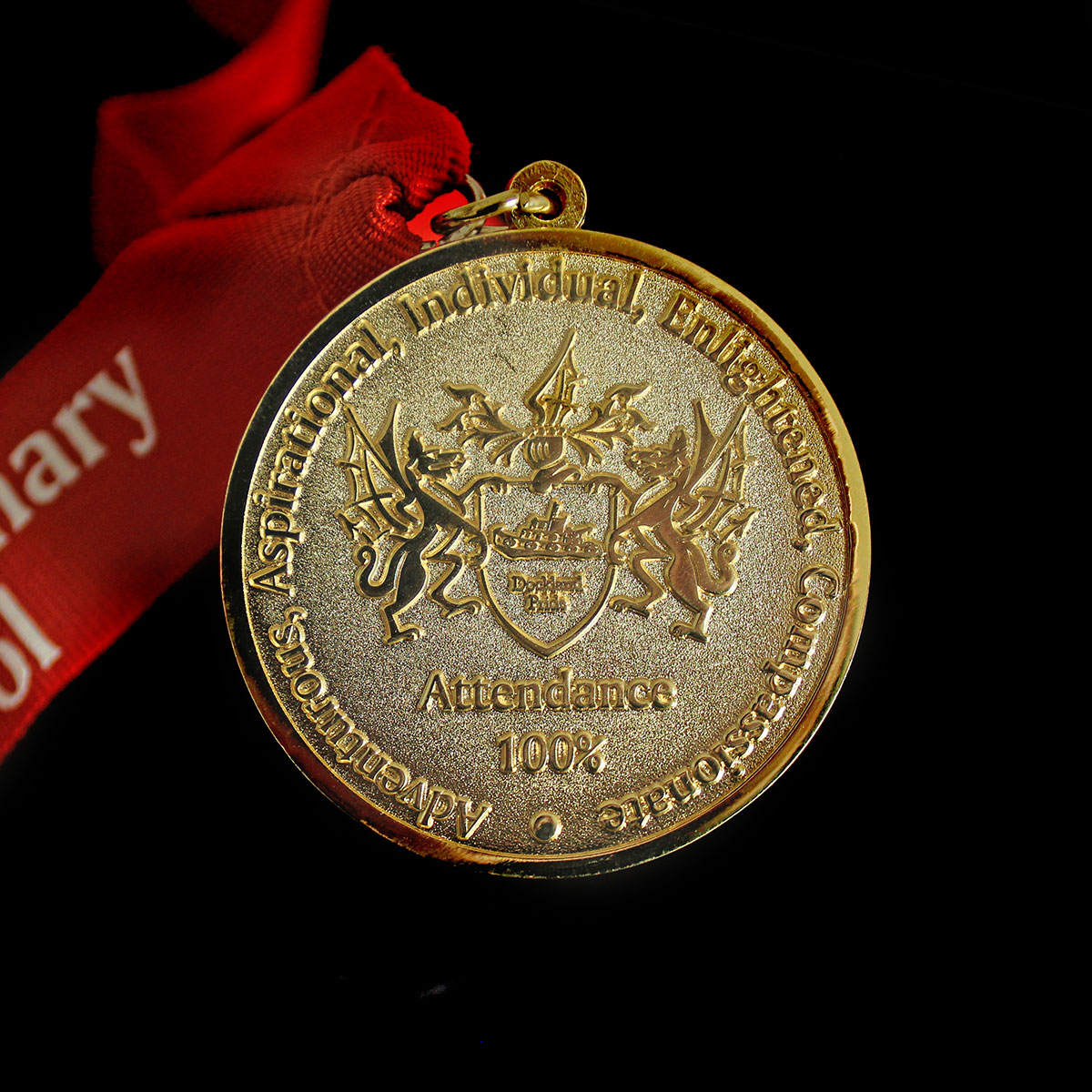 Close up image of 50mm Gold Frosted Polished Redriff Attendance Schools Medal