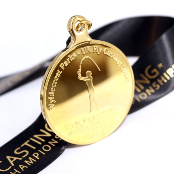 Close up of Gold Fly Casting World Championships 2018 Sports Pendant with ribbon